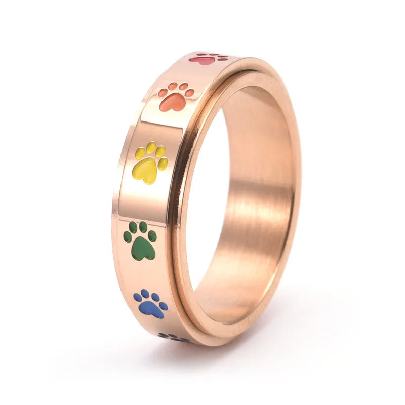 Spinning Stress Reducing Paw Ring – Edelstahl mit Regenbogenpfoten