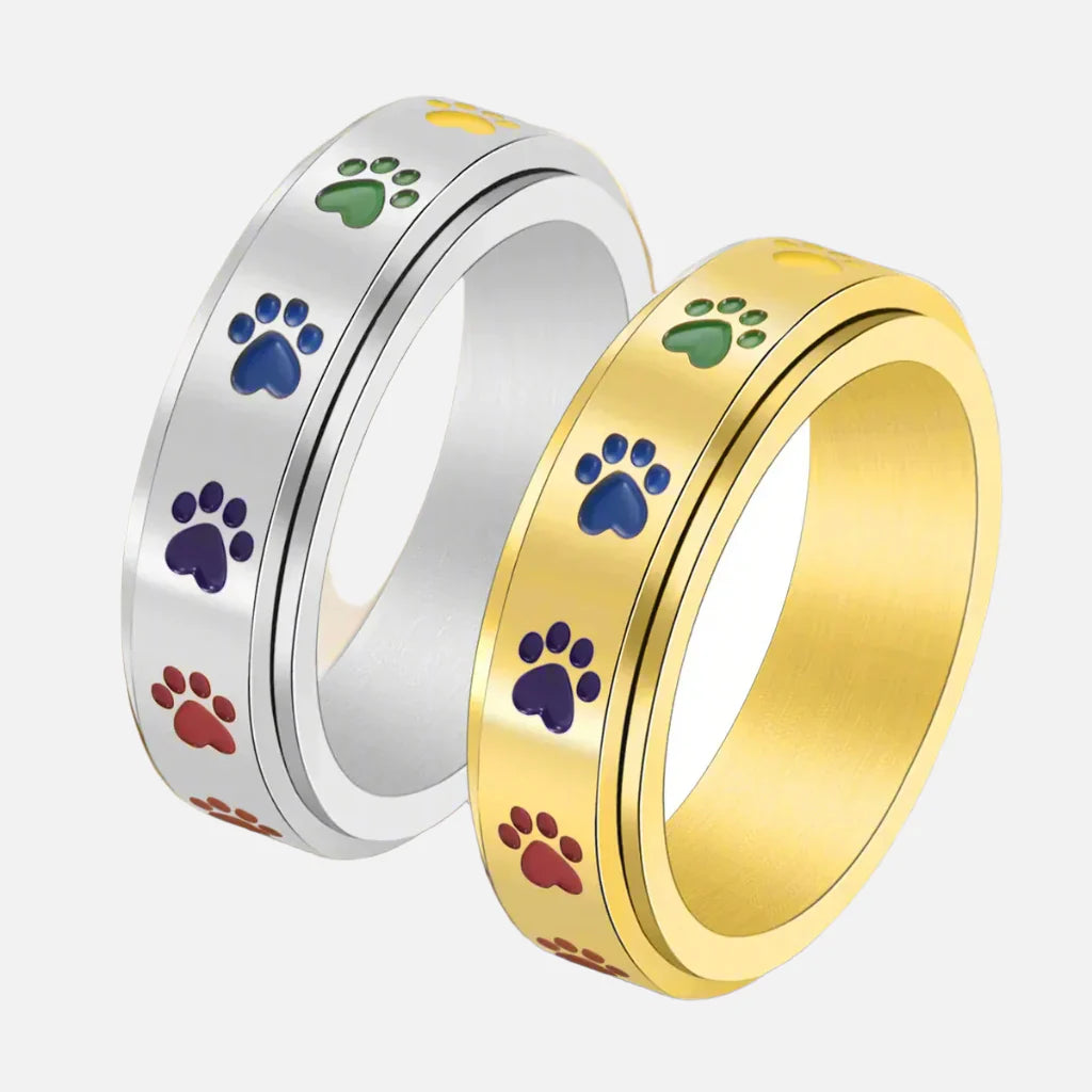 Spinning Stress Reducing Paw Ring – Edelstahl mit Regenbogenpfoten